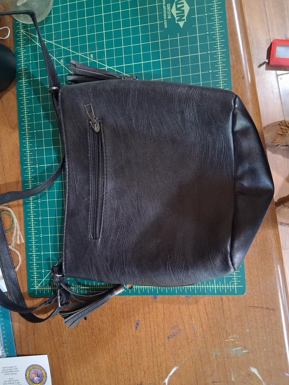 Women’s Black Leather Crossbody Bag with Kangaroo Emblem
